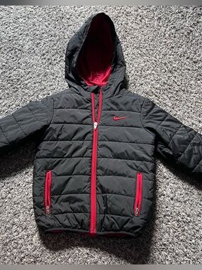 Nike Kids Black Puffer Jacket with Red Trim and Hood